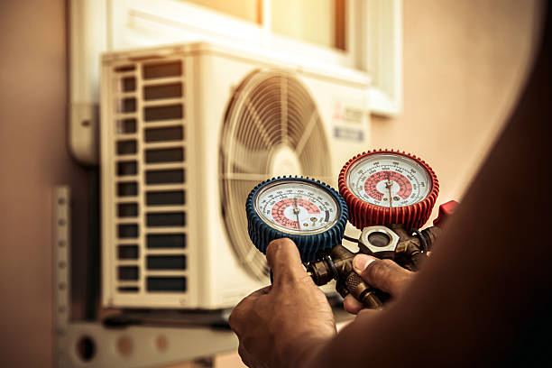 Professional Furnace Repair technician working in Milton Village, MA